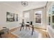 Bright home office featuring large windows, hardwood floors, and contemporary decor at 2553 Creekwood Ter, Decatur, GA 30030