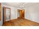 Bedroom with hardwood floors and access to a bathroom and closet at 470 Hunnicutt Se Rd, Mableton, GA 30126