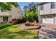 Inviting backyard with a fire pit and chairs, perfect for outdoor relaxation and entertaining at 1189 Norfolk Nw Dr, Acworth, GA 30102