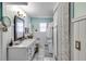 Charming bathroom with marble countertops and a shower and tub combination at 1189 Norfolk Nw Dr, Acworth, GA 30102