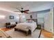Bright bedroom with a queen bed, ceiling fan, and lots of natural light at 1189 Norfolk Nw Dr, Acworth, GA 30102