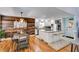 Open kitchen and dining area featuring a breakfast bar and stainless steel appliances at 1189 Norfolk Nw Dr, Acworth, GA 30102
