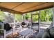 Relaxing screened porch with comfortable seating, perfect for enjoying the outdoors, insect-free at 1189 Norfolk Nw Dr, Acworth, GA 30102