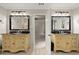 Bright bathroom features dual sink vanities with granite counters and framed mirrors at 2870 Abbottswell Dr, Alpharetta, GA 30022