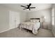 Bright bedroom with a ceiling fan, carpet and an adjacent closet at 2870 Abbottswell Dr, Alpharetta, GA 30022