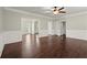 Inviting living room showcasing hardwood floors and classic white wainscoting at 2870 Abbottswell Dr, Alpharetta, GA 30022