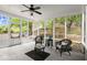 A screened in porch provides comfortable outdoor seating with a calming view of the yard at 2870 Abbottswell Dr, Alpharetta, GA 30022