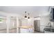 Bright and airy kitchen with a center island, stainless steel appliances, and open layout at 3132 Lunsford Cir, Covington, GA 30014