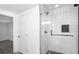 Newly renovated shower with white subway tiles, contrasting dark fixtures, and herringbone floor at 3132 Lunsford Cir, Covington, GA 30014
