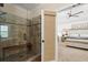 Walk in shower, featuring a bench, with access to the main bedroom at 6250 Bannerhorn Run, Alpharetta, GA 30005