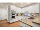 Well-equipped kitchen featuring granite countertops, stainless appliances, and ample white cabinetry at 6250 Bannerhorn Run, Alpharetta, GA 30005