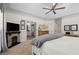 Bright main bedroom with a fireplace, neutral walls, and en suite bathroom access, creating a relaxing retreat at 6250 Bannerhorn Run, Alpharetta, GA 30005