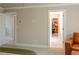 Bright primary bedroom showing the bedroom, bathroom and a walk-in closet at 660 Stately Dr, Woodstock, GA 30188