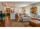 Spacious living area with a modern kitchen, dining space, and comfortable seating arrangement at 660 Stately Dr, Woodstock, GA 30188