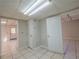 This basement features tile floors and neutral paint at 11511 Highway 92, Woodstock, GA 30188