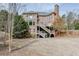 Expansive backyard featuring a large deck, offering ample outdoor entertaining space at 2930 Aquitania Ln, Cumming, GA 30040
