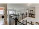 Elegant foyer showcasing an open layout with detailed railings, a grand staircase, and views of the living spaces at 2930 Aquitania Ln, Cumming, GA 30040