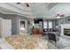 Bright and open main bedroom with a cozy sitting area, fireplace, and en-suite bathroom access for added convenience at 2930 Aquitania Ln, Cumming, GA 30040