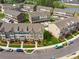 An aerial shot shows a townhome community with manicured lawns and convenient parking at 4259 Baden Aly, Duluth, GA 30097