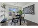 Bright dining area featuring stylish modern furniture and large modern art at 4259 Baden Aly, Duluth, GA 30097