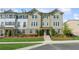 Charming townhome with well-maintained landscaping, beautiful curb appeal, and a welcoming entrance at 4259 Baden Aly, Duluth, GA 30097