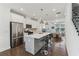 Contemporary kitchen featuring stainless steel appliances, island seating and an open layout to the living area at 4259 Baden Aly, Duluth, GA 30097