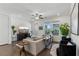 Cozy living room with plush seating, ample natural light, and stylish decor for a comfortable living space at 4259 Baden Aly, Duluth, GA 30097