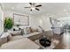 Inviting living room with comfortable seating, hardwood floors, and stylish accents, perfect for relaxing and entertaining at 4259 Baden Aly, Duluth, GA 30097