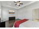 Contemporary main bedroom with recessed lights, ceiling fan, and doorway to an ensuite at 4259 Baden Aly, Duluth, GA 30097