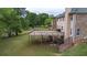 View of the spacious backyard and deck, ideal for outdoor enjoyment at 60 Heritage Keep, Covington, GA 30016