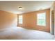 Bedroom featuring two windows that bring natural light into the room, creating a comfortable and inviting atmosphere at 60 Heritage Keep, Covington, GA 30016