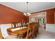 Traditional dining room featuring decorative molding and large window at 60 Heritage Keep, Covington, GA 30016
