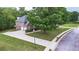 Stately brick home with a two-car garage and a large yard, showcasing the property's curb appeal at 60 Heritage Keep, Covington, GA 30016