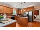 Well-equipped kitchen with stainless steel appliances, an island, and stylish countertops at 60 Heritage Keep, Covington, GA 30016