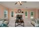 Bright living room with fireplace, large windows, and stylish furnishings at 60 Heritage Keep, Covington, GA 30016