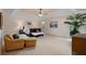 Spacious main bedroom with tray ceilings, neutral tones, ceiling fan, and bright windows at 60 Heritage Keep, Covington, GA 30016