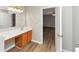 Bathroom features a white vanity and sink with an entrance to the bedroom at 1023 Saint Augustine Pkwy, Locust Grove, GA 30248