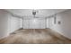 Spacious garage with an automatic door, suitable for parking and storage at 1023 Saint Augustine Pkwy, Locust Grove, GA 30248