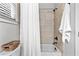 Shower and tub with tile surround and white shower curtain at 1985 Chapel Estates Ln, Dacula, GA 30019