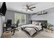 Bedroom with a ceiling fan, shelves, a workstation and a computer at 1985 Chapel Estates Ln, Dacula, GA 30019