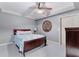 Neutral bedroom with a ceiling fan, carpeted floors and gray walls at 1985 Chapel Estates Ln, Dacula, GA 30019