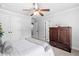 Bedroom with ceiling fan, carpet, and dresser at 1985 Chapel Estates Ln, Dacula, GA 30019