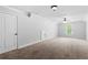 Bonus room with ceiling fan and carpet at 1985 Chapel Estates Ln, Dacula, GA 30019