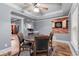 Open concept game room features a bar top, table, four chairs, and a dart board at 1985 Chapel Estates Ln, Dacula, GA 30019
