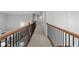Hallway with detailed ceiling design and railing at 1985 Chapel Estates Ln, Dacula, GA 30019