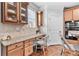 Bright kitchen with granite countertops, desk space, stainless oven and wood cabinets at 1985 Chapel Estates Ln, Dacula, GA 30019