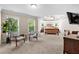 Main bedroom with ceiling fan and natural light from two windows at 1985 Chapel Estates Ln, Dacula, GA 30019