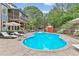 Inviting backyard with a private pool, screened porch, and ample space for outdoor relaxation and entertainment at 1985 Chapel Estates Ln, Dacula, GA 30019