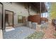 Townhome backyard with gravel, patio, and modern privacy screen, perfect for outdoor enjoyment at 2329 Mason Dr # D24, Atlanta, GA 30316