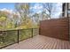 Balcony showcasing wooden floors and wooded views at 2329 Mason Dr # D24, Atlanta, GA 30316